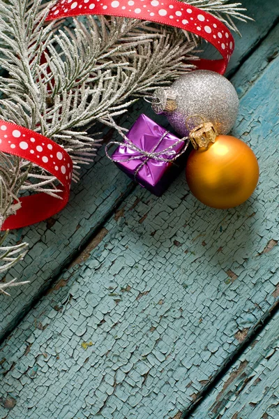 Little New year tree toys on the wood backing — Stock Photo, Image