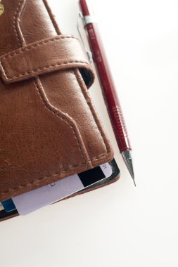 Cüzdan ve bir kalem 