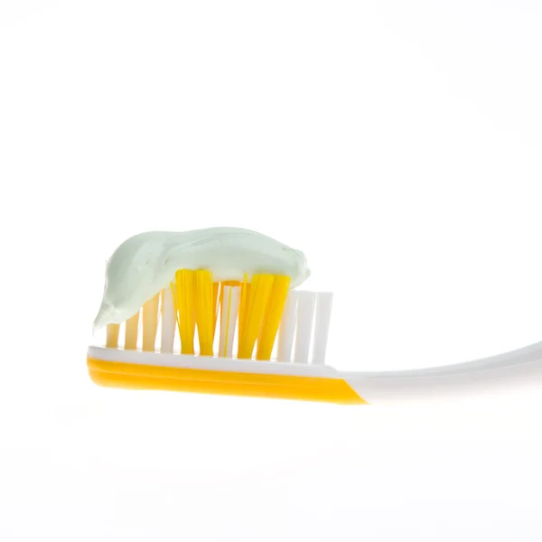 Yellow toothbrush isolated — Stock Photo, Image