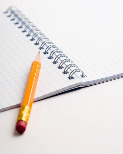 Pencil on the notepad composition — Stock Photo, Image