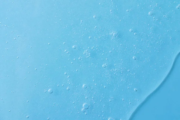 Fondo de gel cosmético con burbujas. Color azul pastel, espacio de copia para texto o diseño. —  Fotos de Stock