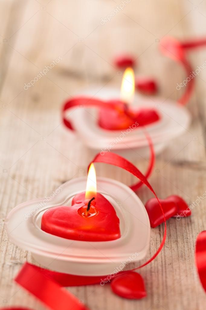 Heart shaped candles . Stock Photo by ©Vitaina 54172443