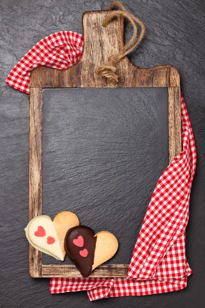 Tabla de cortar y galletas . — Foto de Stock