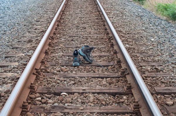 Hiking boots on the railway line — Stock Photo, Image