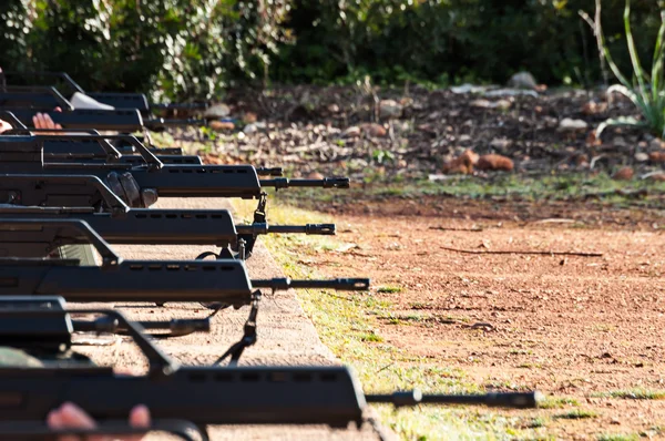 Lijn van het vuur met assault rifle Stockfoto