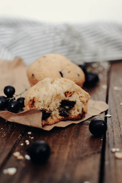 The tasty muffins with chocolate on a wooden desk. Muffins for perfect and beautiful breakfast.	
