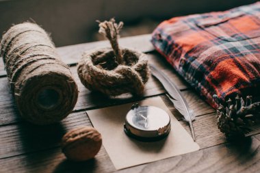 Hipster traveler hiking pack. Set for hiking in the mountains or forest. Scout concept. Rustic flat lay on a wooden table. Hipster lumberjack flat lay.	