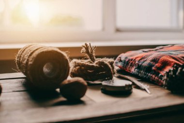 Hipster traveler hiking pack. Set for hiking in the mountains or forest. Scout concept. Rustic flat lay on a wooden table. Hipster lumberjack flat lay.	