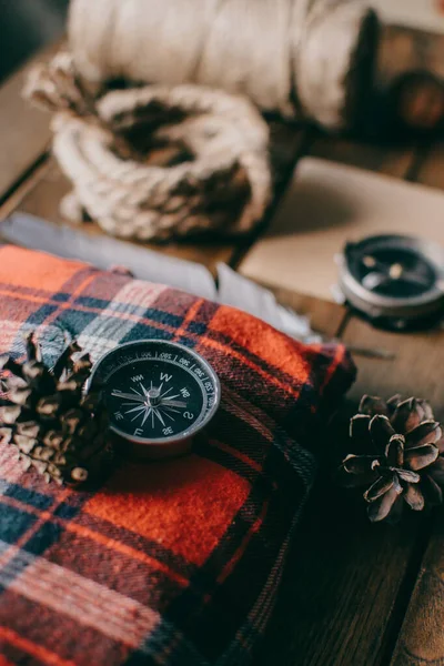 Hipster traveler hiking pack. Set for hiking in the mountains or forest. Scout concept. Rustic flat lay on a wooden table. Hipster lumberjack flat lay.	