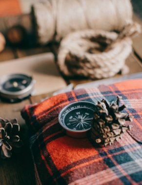 Hipster traveler hiking pack. Set for hiking in the mountains or forest. Scout concept. Rustic flat lay on a wooden table. Hipster lumberjack flat lay.	