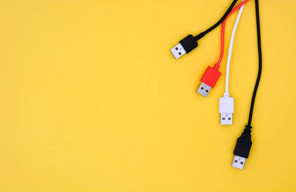 Top View Black White Red Color Usb Cables Yellow Background — Stock fotografie