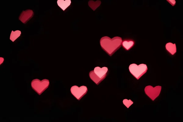 ピンクハートボケの背景 愛バレンタインデーのコンセプト — ストック写真