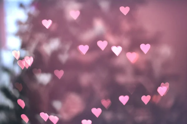 ピンクハートボケの背景 愛バレンタインデーのコンセプト — ストック写真