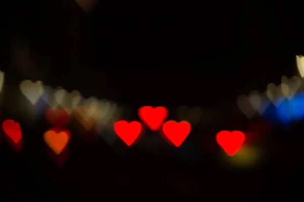 ロマンチックな多色ハートボケ抽象的なバレンタインの背景 — ストック写真