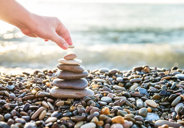 Human Hand Put Last Stone Pyramid — Stock Photo, Image