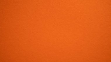 Turuncu duvar dokusu arka planı. Havuç rengi arka plan tasarımı. Amber, balkabağım, cadılar bayramı arkaplanı
