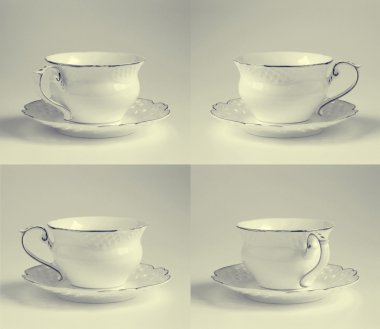 Beyaz fincan ve çay tabağı