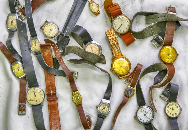 Old wrist watches, photo in old image style. — Stock Photo, Image
