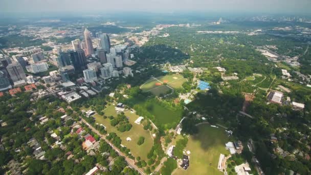 Atlanta Aerial V318 Flying High Low Backward Midtown Area Cityscape — стокове відео