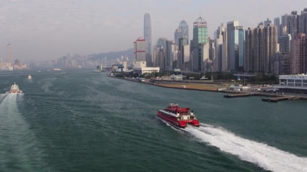 Hong Kong Aerial V44 Flying Low Ferry Victoria Harbour Heading — Video