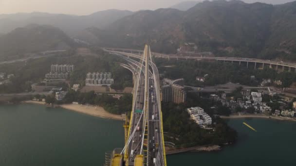 Hong Kong Aerial V100 Flying Low Ting Kau Bridge Sunset — стокове відео