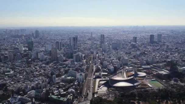 Tokyo Japan Aerial V95 Flying Yoyogi Park Panning Cityscape Views — Stock Video