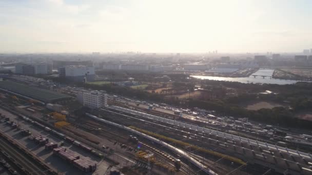 Tokyo Japan Aerial V129 Flying Low Bullet Train Terminal Area — Video Stock