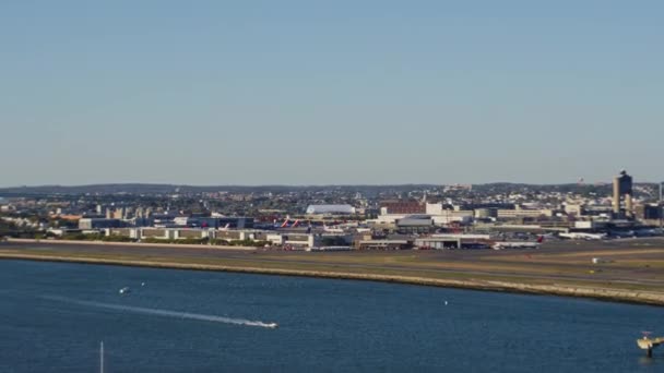 Boston Massachusetts Aerial V162 Low Panning Cityscape Logan Airport Center — стокове відео