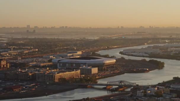 New Jersey Aerial V22 Panoramic Sunrise Cityscape Looks Football Arena — стокове відео