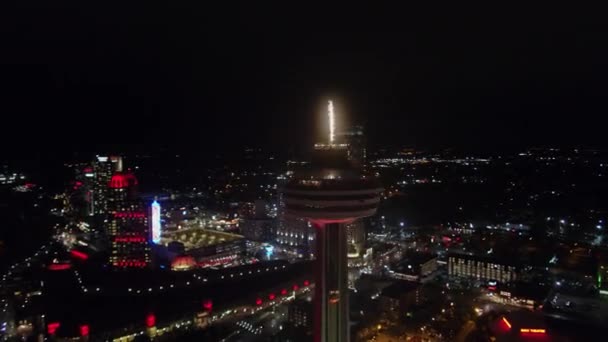 Niagara Falls Ontario Aerial V20 Full Nighttime Panoramic Cityscape Skylon — Stock Video