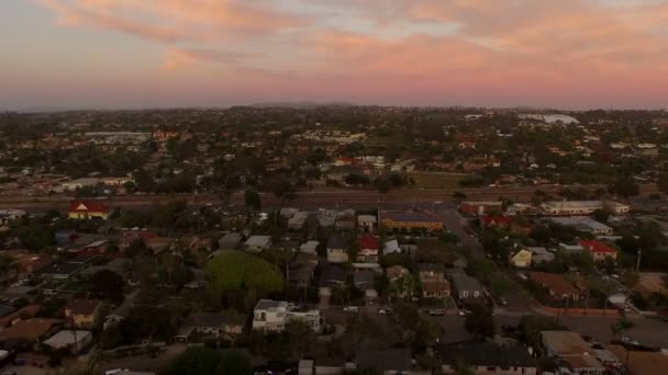 Flying over cliffside homes — Stock Video