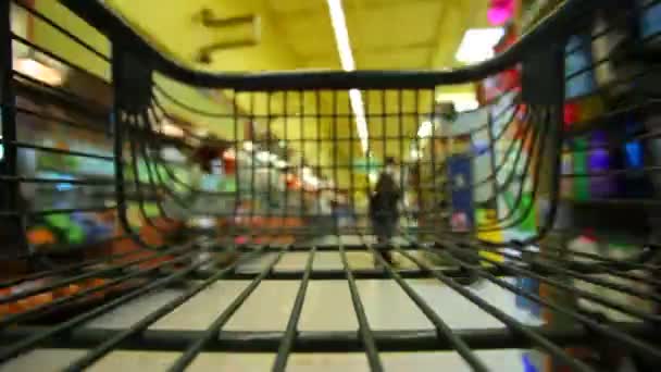 Shopping cart going around  store — Stock Video