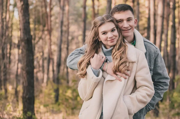 Guy Hugs Girl Smiles Pine Forest Place Inscription — Stock Photo, Image