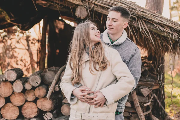 Young Handsome Guy Hugs Girl Waist Smiles Gazebo Background Firewood — Stock Photo, Image