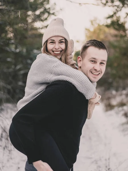 Woman Model Appearance Sits Man Back Hugs His Neck Background — Stock Photo, Image