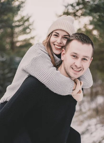 Woman Model Appearance Sits Man Back Hugs His Neck Background — Stock Photo, Image