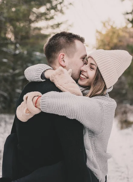 Man Holds Woman His Arms Kisses Her — Stock Photo, Image