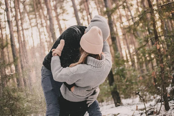 Man Throws Woman Snow Pine Forest — Stock Photo, Image