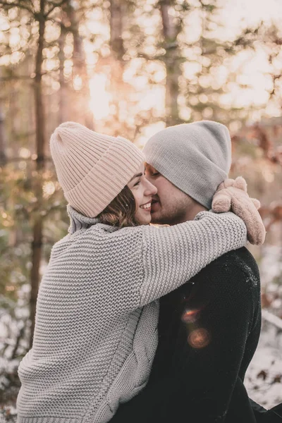Woman Hugs Man Dressed Mittens Pine Forest — Stock Photo, Image