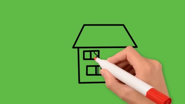 緑の背景に色の組み合わせで大きな家の芸術を描き — ストック動画