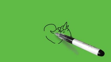 Yeşil ekran arka planında siyah, gri, sarı ve beyaz renkli vahşi bir keçi yapmak