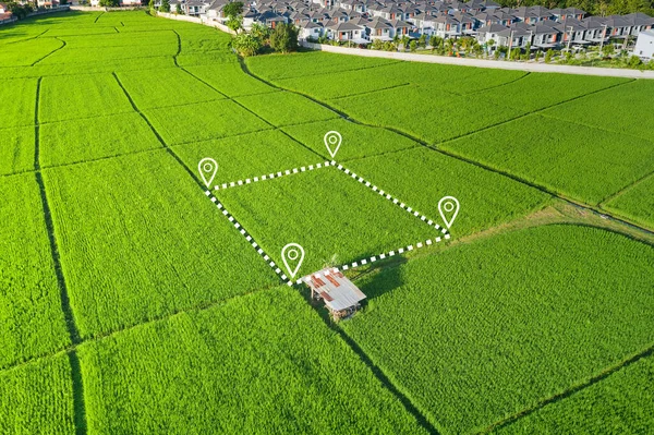 Land plot in aerial view. Identify registration symbol of vacant area for map. That property, real estate for business of home, house or residential i.e. construction, development, sale, rent and buy.