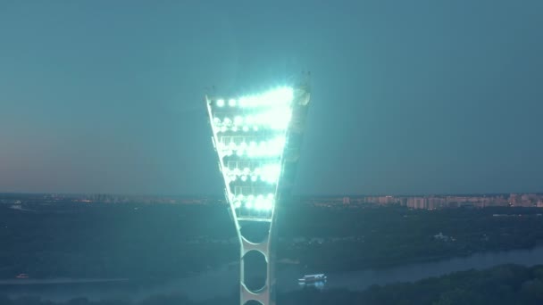 Switching on the light tower of a football stadium — Stock Video
