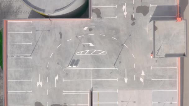 Large empty parking lot.urn in the parking lot. white line markings — Stock Video