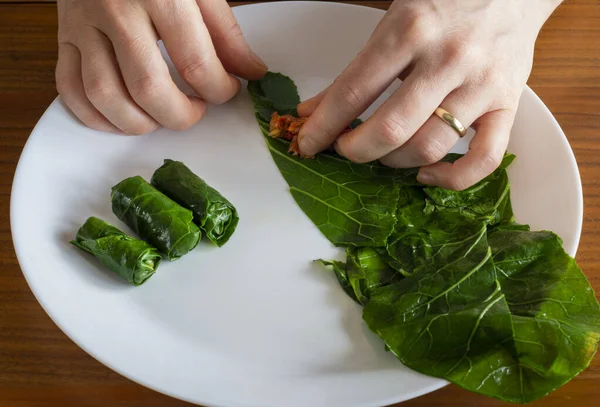 Collard Greens stuffed.  Collard Greens stuffed with meat and rice, traditional Turkish cuisine. black cabbage rolling