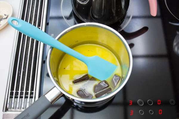 Melting Butter Chocolate Saucepan She Making Birthday Cake Biscuits Chocolate — Stock Photo, Image