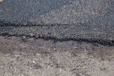 Soyut yol onarımı geçmişi. Asfalt yenileme. Yol yüzeyi güncelleniyor.