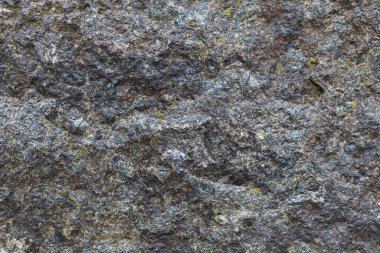 Koyu renk doğal taş dokusu, arka plan. Sert yüzey