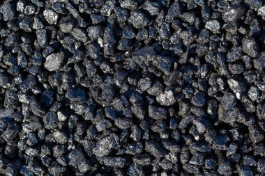 Evrensel illüstrasyon arka planı için doğal siyah kömür. Endüstriyel kömür. Ev yakıtı, enerji yakıtı, metalurji ve kimya endüstrisi için hammadde olarak kullanılıyor.