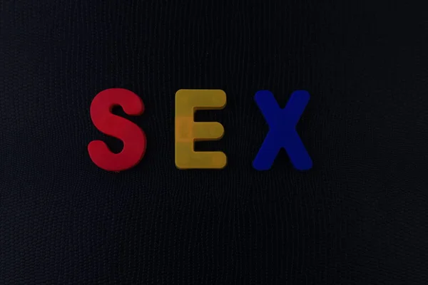 The word or text Sex written in the alphabet with colorful letters on a magnet.